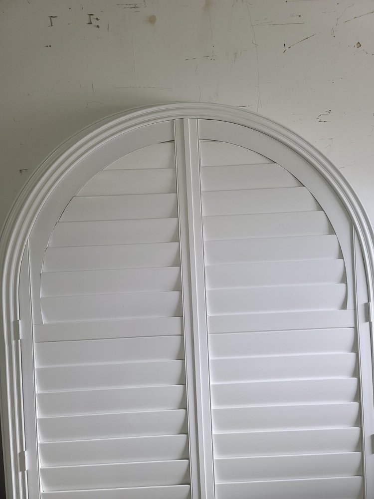 arched-window-plantation-shutters-finished
