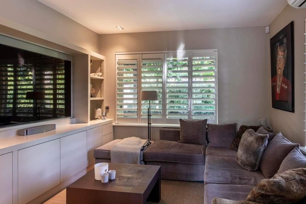 modern-living-room-white-plantation-shutters