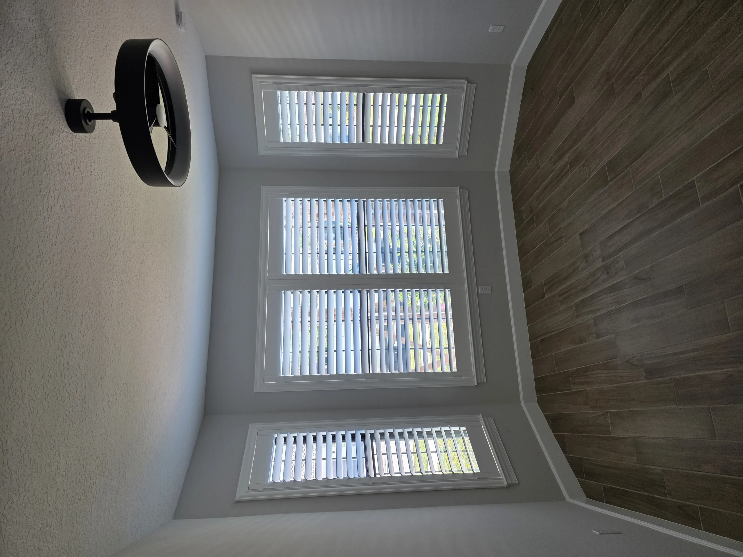Interior of a Florida home showcasing aluminum shutters enhancing energy efficiency and comfort